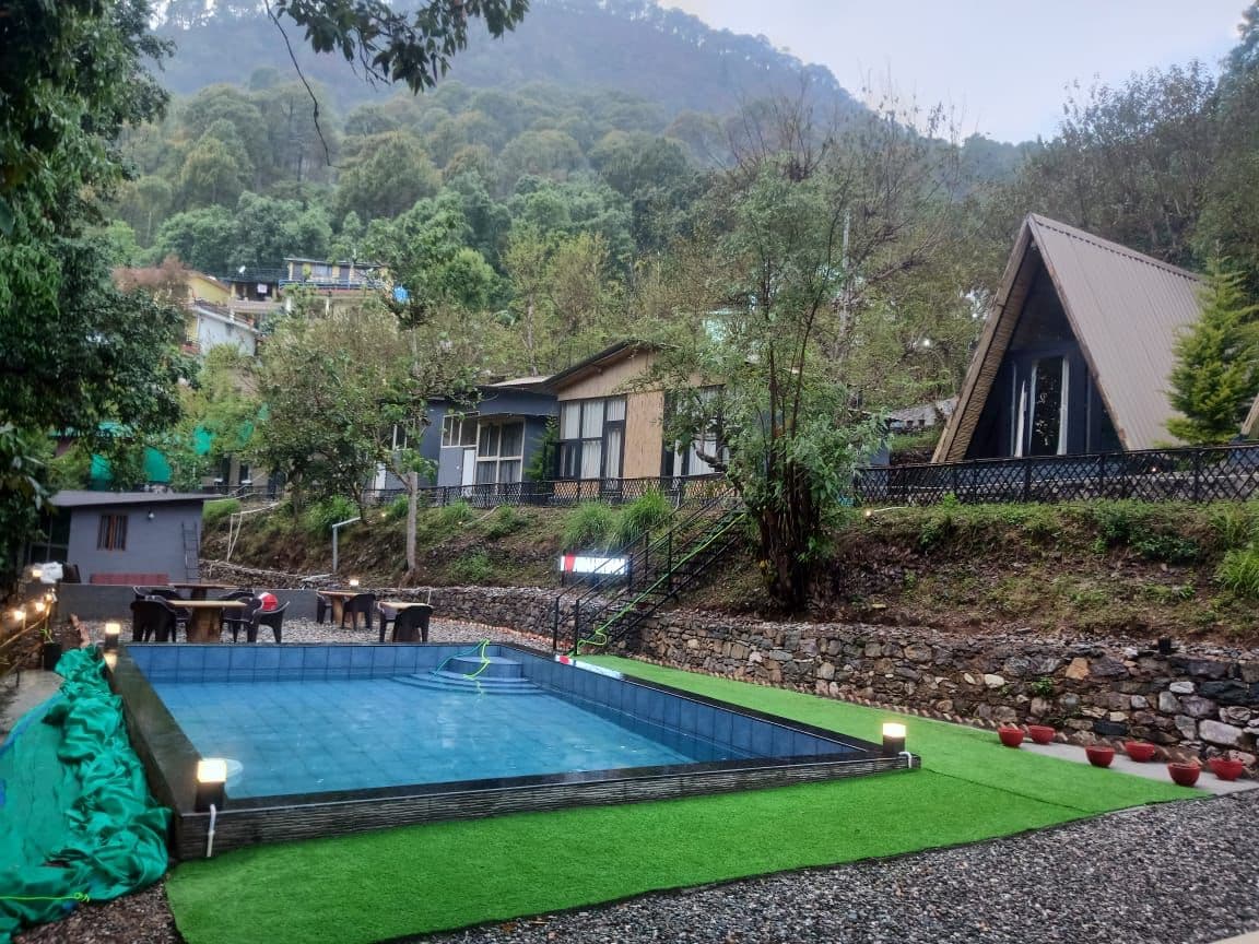 Misty forest view of Arahnyam Resort in Bhimtal